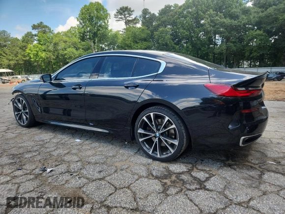 2020 BMW 8 Series 840i with VIN WBAGV2C02LCE04556, listed as a Copart auction lot 61073745 with 60,651 mi miles and Salvage title. Bid and sale history available at DreamBid. Image 2.
