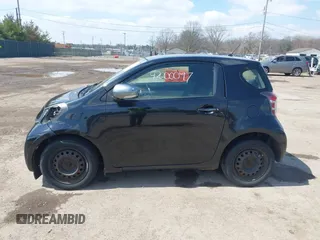 2012 Scion iQ with VIN JTNJJXB03CJ018302, listed as a IAAI auction lot 42000097 with 191,918 mi miles. Bid and sale history available at carsss.com. Image 15.