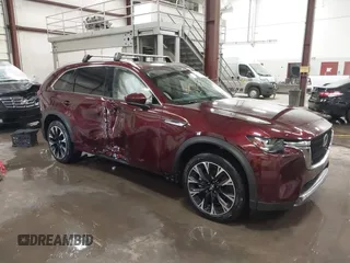 2024 Mazda CX-90 Premium with VIN JM3KKDHA1R1146283, listed as a IAAI auction lot 41862960 with 36,352 mi miles and . Bid and sale history available at DreamBid. Image 1.