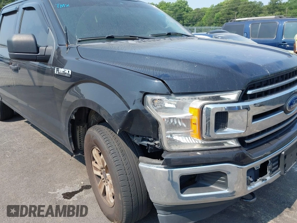 2019 Ford F-150 XL with VIN 1FTEW1E56KFA63764, listed as a IAAI auction lot 42410872 with 124,648 mi miles and . Bid and sale history available at DreamBid. Image 6.