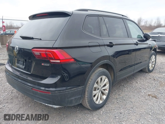 2019 Volkswagen Tiguan S with VIN 3VV0B7AX9KM019775, listed as a IAAI auction lot 41897497 with 61,691 mi miles and . Bid and sale history available at DreamBid. Image 4.