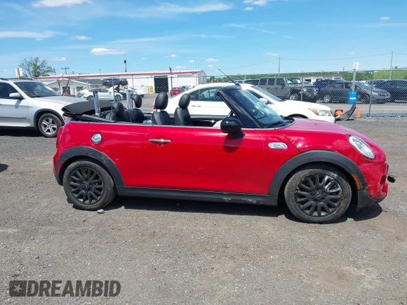 2017 MINI Convertible Cooper S with VIN WMWWG9C53H3C22950, listed as a IAAI auction lot 42297714 with 22,613 mi miles and . Bid and sale history available at DreamBid. Image 13.