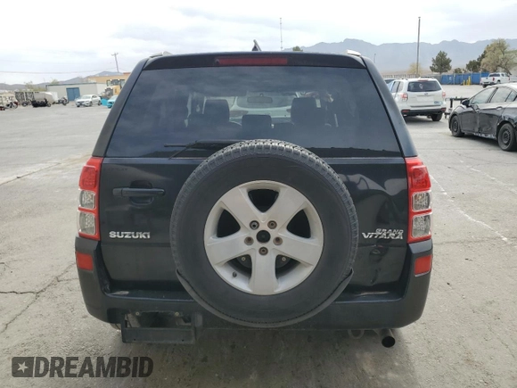 2009 Suzuki Grand Vitara with VIN JS3TE044094100649, listed as a Copart auction lot 52033855 with 137,460 mi miles and Salvage title. Bid and sale history available at DreamBid. Image 6.