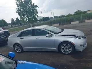 2013 Lincoln MKZ z VIN 3LN6L2G98DR803528, wystawiony jako IAAI lot #42573341 z przebiegiem 140 006 mil mil oraz . Historia ofert i sprzedaży dostępna na DreamBid. Obrazek 13.