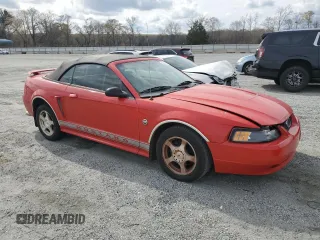 2004 Ford Mustang Deluxe with VIN 1FAFP44644F227356, listed as a Copart auction lot 50237355 with 106,119 mi miles and Salvage title. Bid and sale history available at DreamBid. Image 4.