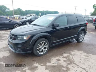 2015 Dodge Journey R/T with VIN 3C4PDDEG1FT554904, listed as a IAAI auction lot 42415888 with 143,039 mi miles and . Bid and sale history available at DreamBid. Image 2.