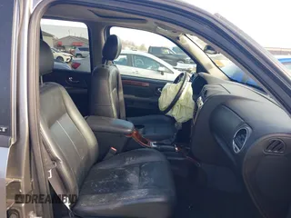 2005 GMC Envoy SLE with VIN 1GKDT13S852362380, listed as a IAAI auction lot 42031727 with 76,711 mi miles. Bid and sale history available at carsss.com. Image 5.
