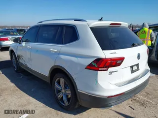 2019 Volkswagen Tiguan SEL Premium with VIN 3VV4B7AX0KM007788, listed as a IAAI auction lot 41227707 with 67,859 mi miles. Bid and sale history available at carsss.com. Image 3.