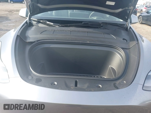 2025 Tesla Model Y Long Range with VIN 7SAYGDEE3SF218015, listed as a IAAI auction lot 41448106 with 1,588 mi miles and . Bid and sale history available at carsss.com. Image 10.