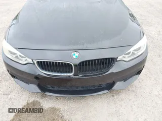 2015 BMW 4 Series 428i with VIN WBA3N3C55FK232319, listed as a IAAI auction lot 42136421 with 140,300 mi miles and . Bid and sale history available at DreamBid. Image 6.