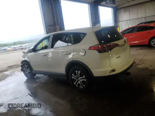 2018 Toyota RAV4 LE with VIN JTMBFREV2JJ182828, listed as a Copart auction lot 55668945 with 164,683 mi miles and Salvage Title. Bid and sale history available at DreamBid. Image 2.