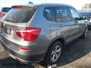 2011 BMW X3 28i with VIN 5UXWX5C55BL708710, listed as a IAAI auction lot 41940504 with 162,240 mi miles. Bid and sale history available at carsss.com. Image 4.