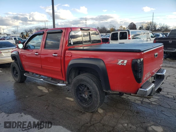 2011 GMC Canyon SLT with VIN 1GTH6NFP1B8113219, listed as a Copart auction lot 80649194 with 120,979 mi miles and Salvage Title. Bid and sale history available at carsss.com. Image 2.