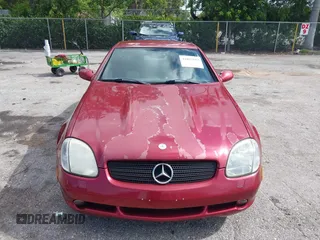2000 Mercedes-Benz SLK 230 Kompressor with VIN WDBKK47F2YF146797, listed as a IAAI auction lot 42823113 with 35,881 mi miles and . Bid and sale history available at DreamBid. Image 6.