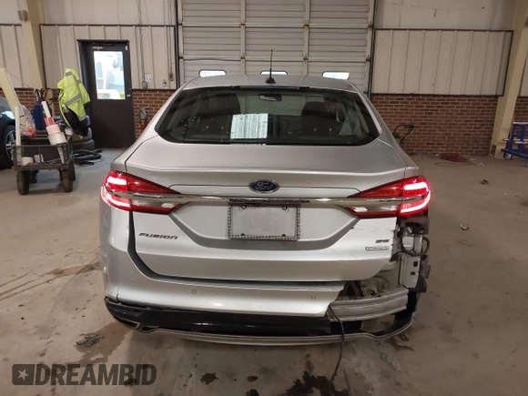 2017 Ford Fusion SE z VIN 3FA6P0H95HR203170, wystawiony jako IAAI lot #41569303 z przebiegiem 143 287 mil mil oraz . Historia ofert i sprzedaży dostępna na DreamBid. Obrazek 17.