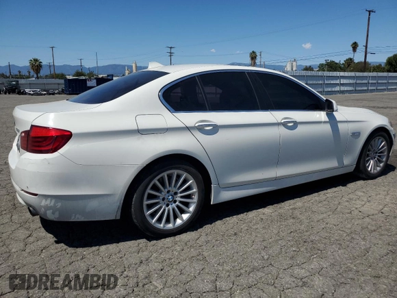 2013 BMW 5 Series 535i with VIN WBAFR7C56DC823291, listed as a Copart auction lot 56621415 with 100,423 mi miles and Salvage title. Bid and sale history available at DreamBid. Image 3.