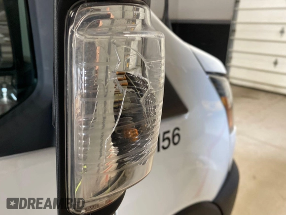 2020 Ford Transit Cargo with VIN 1FTBR1Y87LKA53852, listed as a IAAI auction lot 42300106 with 89,023 mi miles and . Bid and sale history available at DreamBid. Image 20.