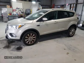 2018 Ford Escape Titanium with VIN 1FMCU9J98JUB17446, listed as a Copart auction lot 53676755 with 115,894 mi miles and Salvage title. Bid and sale history available at DreamBid. Image 1.