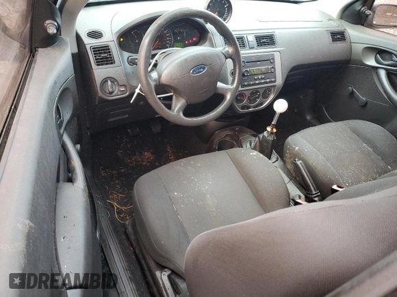 2007 Ford Focus S with VIN 1FAFP31N87W345162, listed as a Copart auction lot 44244185 with 136,207 mi miles and Clean Title. Bid and sale history available at DreamBid. Image 8.