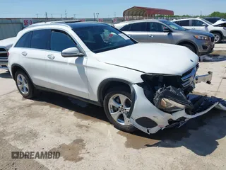 2018 Mercedes-Benz GLC 300 with VIN WDC0G4JB9JV056407, listed as a IAAI auction lot 41965217 with 77,228 mi miles and . Bid and sale history available at DreamBid. Image 1.