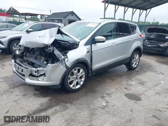 2013 Ford Escape SEL z VIN 1FMCU9H97DUA34665, wystawiony jako IAAI lot #42258567 z przebiegiem 174 227 mil mil oraz . Historia ofert i sprzedaży dostępna na DreamBid. Obrazek 19.