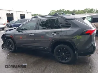 2022 Toyota RAV4 Hybrid SE with VIN JTM16RFV7ND067284, listed as a IAAI auction lot 42637821 with 20,512 mi miles and . Bid and sale history available at DreamBid. Image 14.
