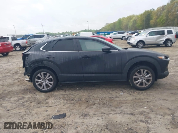 2020 Mazda CX-30 Select with VIN 3MVDMBCL3LM104988, listed as a IAAI auction lot 41951565 with 53,685 mi miles and . Bid and sale history available at DreamBid. Image 14.