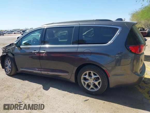 2017 Chrysler Pacifica Touring L with VIN 2C4RC1BG0HR826881, listed as a IAAI auction lot 42171240 with 214,188 mi miles and . Bid and sale history available at DreamBid. Image 14.