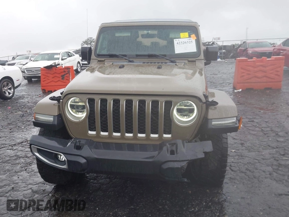 2020 Jeep Gladiator Overland z VIN 1C6HJTFG0LL160699, wystawiony jako IAAI lot #42326325 z przebiegiem 65 639 mil mil oraz . Historia ofert i sprzedaży dostępna na DreamBid. Obrazek 6.