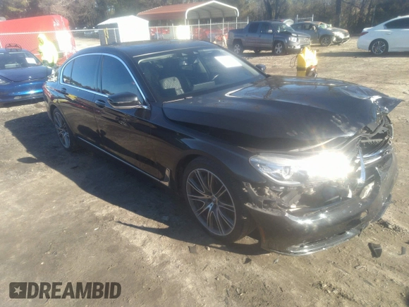 2018 BMW 7 Series 740i with VIN WBA7E2C57JG742257, listed as a IAAI auction lot 41353435 with 77,125 mi miles. Bid and sale history available at carsss.com. Image 1.
