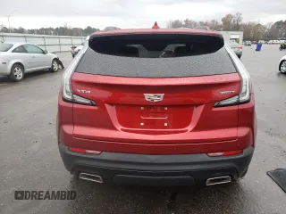 2022 Cadillac XT4 FWD Sport with VIN 1GYFZER43NF108145, listed as a Copart auction lot 83984054 with 36,603 mi miles and Salvage title. Bid and sale history available at DreamBid. Image 6.