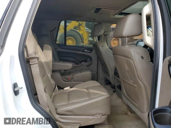 2015 Chevrolet Tahoe LTZ with VIN 1GNSKCKC1FR310018, listed as a Copart auction lot 71798454 with 244,179 mi miles and Salvage title. Bid and sale history available at DreamBid. Image 11.