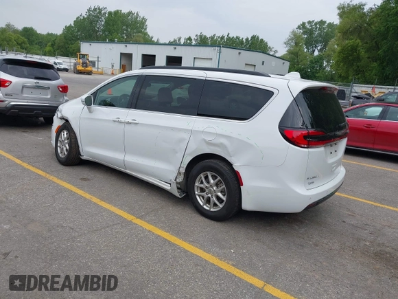 2022 Chrysler Pacifica Touring L with VIN 2C4RC1BG3NR149675, listed as a IAAI auction lot 42470593 with 59,956 mi miles and . Bid and sale history available at DreamBid. Image 3.
