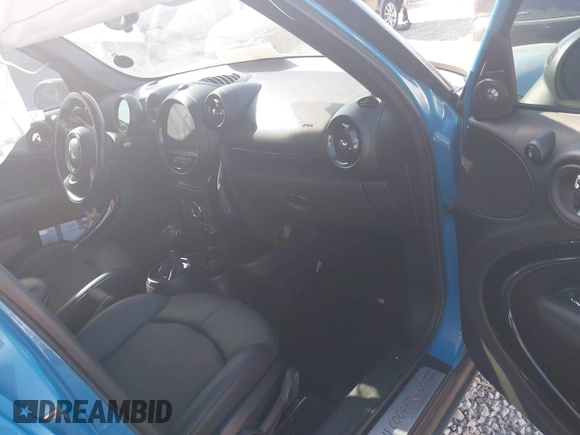 2016 MINI Countryman S with VIN WMWZC3C58GWT10084, listed as a IAAI auction lot 42093564 with 120,694 mi miles and . Bid and sale history available at DreamBid. Image 5.