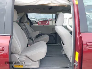2014 Toyota Sienna LE AAS with VIN 5TDKK3DC4ES462090, listed as a IAAI auction lot 41942354 with 215,814 mi miles. Bid and sale history available at carsss.com. Image 8.