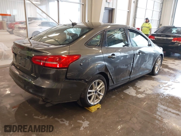 2016 Ford Focus SE with VIN 1FADP3F20GL234077, listed as a IAAI auction lot 41933546 with 106,184 mi miles and . Bid and sale history available at DreamBid. Image 4.