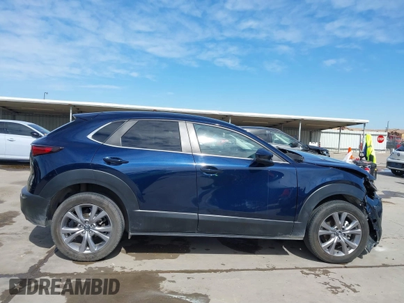 2021 Mazda CX-30 Select with VIN 3MVDMABL5MM272418, listed as a IAAI auction lot 41783355 with 25,429 mi miles and . Bid and sale history available at DreamBid. Image 14.