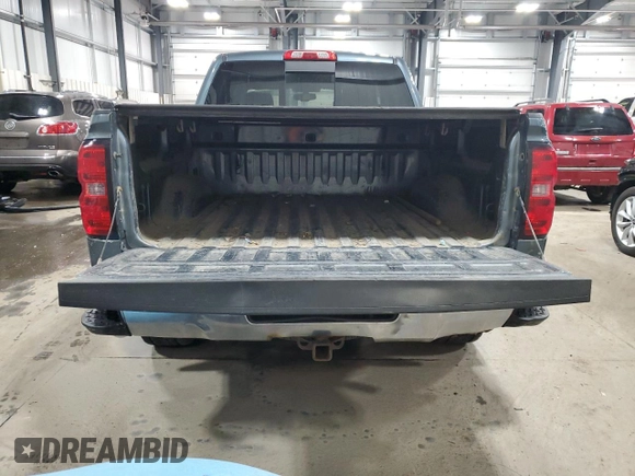 2014 Chevrolet Silverado 1500 LTZ with VIN 3GCUKSEC9EG245991, listed as a Copart auction lot 46620565 with 128,370 mi miles and Salvage Title. Bid and sale history available at DreamBid. Image 6.