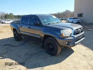 2015 Toyota Tacoma PreRunner z VIN 3TMJU4GN3FM180002, wystawiony jako IAAI lot #41617282 z przebiegiem 179 105 mil mil oraz . Historia ofert i sprzedaży dostępna na DreamBid. Obrazek 1.