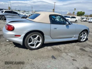 2003 Mazda MX-5 Miata Cloth z VIN JM1NB353430301685, wystawiony jako Copart lot #48756715 z przebiegiem 57 414 mil mil oraz Szkoda całkowita • Salvage title. Historia ofert i sprzedaży dostępna na DreamBid. Obrazek 3.