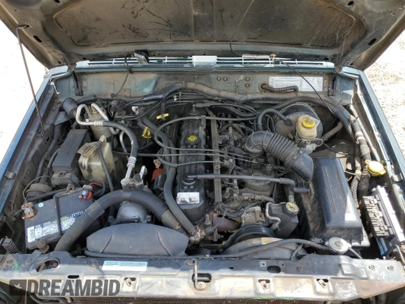 2001 Jeep Cherokee Sport with VIN 1J4FT48SX1L590135, listed as a Copart auction lot 53502945 with 362,941 mi miles and Non Repairable. Bid and sale history available at carsss.com. Image 12.
