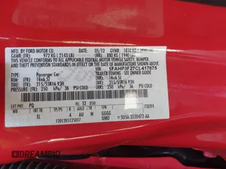 2012 Ford Focus SE with VIN 1FAHP3F27CL417875, listed as a IAAI auction lot 42128614 with 56,961 mi miles. Bid and sale history available at carsss.com. Image 9.