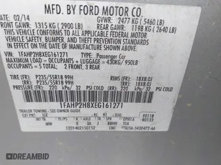 2014 Ford Taurus SEL with VIN 1FAHP2H8XEG161271, listed as a IAAI auction lot 42105228 with 140,256 mi miles. Bid and sale history available at carsss.com. Image 9.