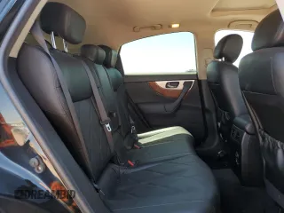 2015 Infiniti QX70 z VIN JN8CS1MW9FM481836, wystawiony jako Copart lot #57801425 z przebiegiem 130 011 mil mil oraz Szkoda całkowita • Salvage title. Historia ofert i sprzedaży dostępna na DreamBid. Obrazek 11.