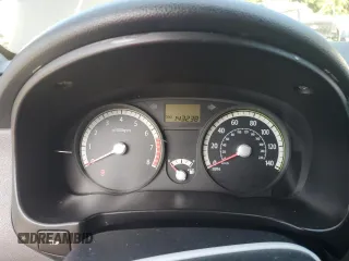 2009 Kia Rio LX with VIN KNADE223296515613, listed as a Copart auction lot 62008194 with 143,238 mi miles and Salvage Title. Bid and sale history available at carsss.com. Image 9.