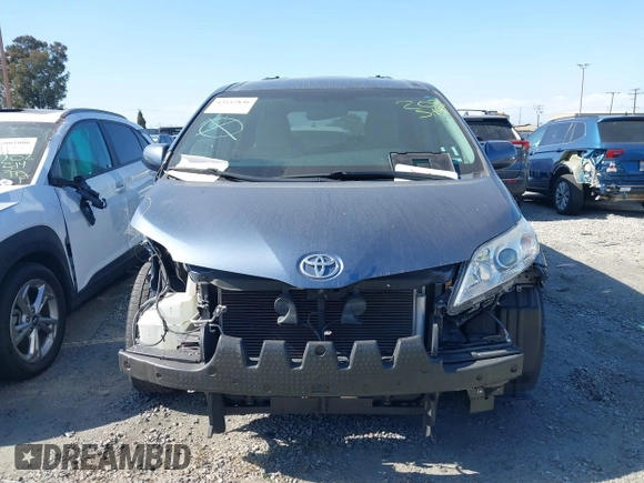2015 Toyota Sienna LE AAS with VIN 5TDKK3DC7FS649602, listed as a IAAI auction lot 42152836 with 70,892 mi miles and . Bid and sale history available at DreamBid. Image 13.