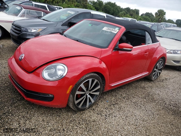 2014 Volkswagen Beetle Convertible 2.5L with VIN 3VW5P7AT0EM803041, listed as a Copart auction lot 73660644 with 0 mi miles and Salvage Title. Bid and sale history available at carsss.com. Image 1.