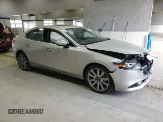 2022 Mazda 3 Premium with VIN 3MZBPADL3NM317206, listed as a Copart auction lot 76184724 with 24,134 mi miles and Salvage Title. Bid and sale history available at DreamBid. Image 4.