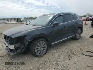 2021 Mazda CX-9 Carbon Edition z VIN JM3TCADY9M0514372, wystawiony jako Copart lot #52902555 z przebiegiem 99 812 mil mil oraz Szkoda całkowita • Salvage title. Historia ofert i sprzedaży dostępna na DreamBid. Obrazek 1.