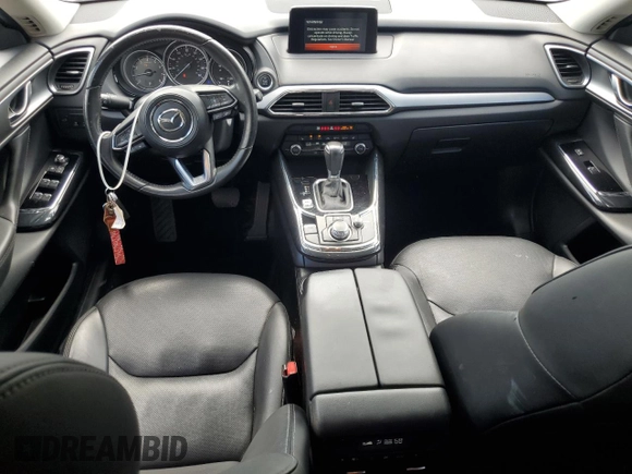 2019 Mazda CX-9 Touring with VIN JM3TCACY6K0334121, listed as a Copart auction lot 64901735 with 112,328 mi miles and Salvage title. Bid and sale history available at DreamBid. Image 8.